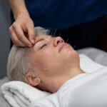 high-angle-woman-acupuncture-treatment